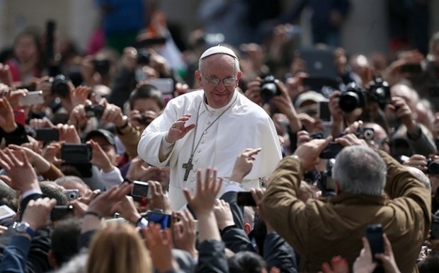 Pope Francis greets the faithful